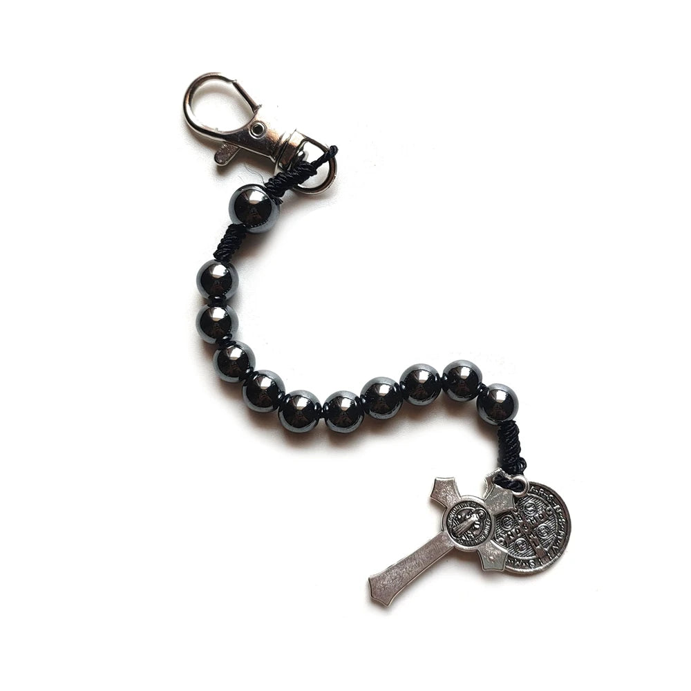 Pulseras de San Benito con cruz de rosario y cuentas de hematita
