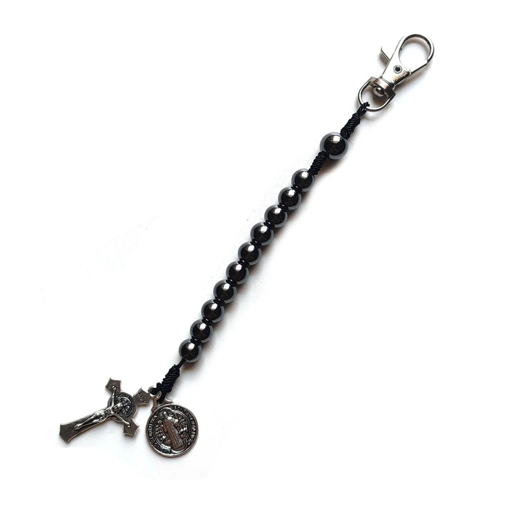 Pulseras de San Benito con cruz de rosario y cuentas de hematita