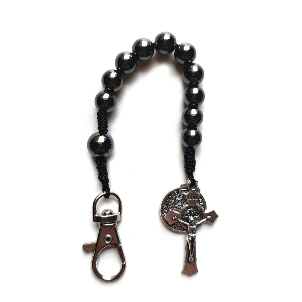 Pulseras de San Benito con cruz de rosario y cuentas de hematita