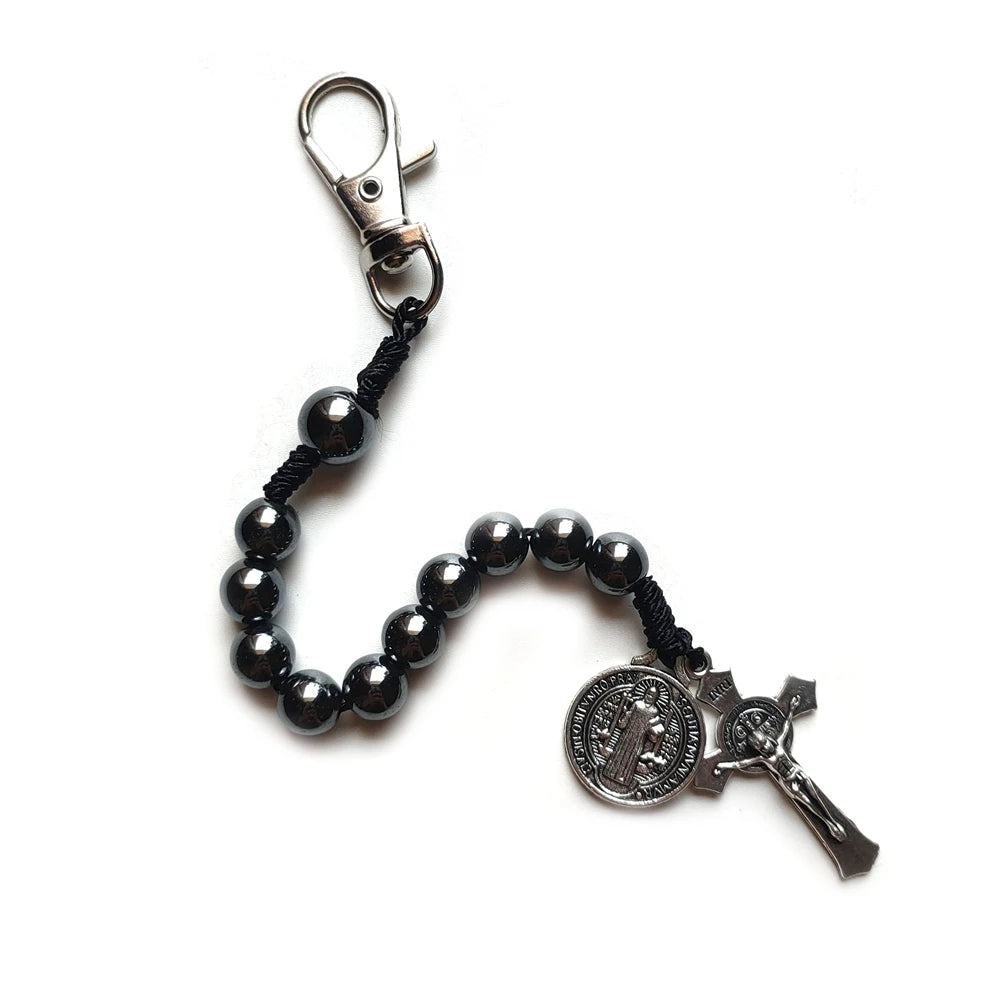 Pulseras de San Benito con cruz de rosario y cuentas de hematita